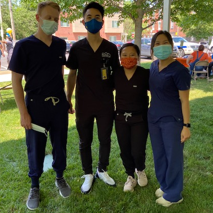 Drexel College of Nursing and Health Professions Physician Assistant students Miles Danis, Maikie Sengdang, Summer Truong, and Vi Vo volunteering at the Community Wellness HUB